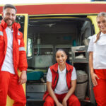 Rapid Response Staffing - group of staff in front of ambulance